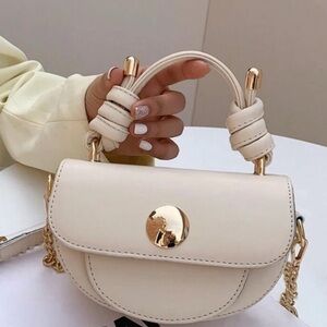 Chic Cream Top-Handle Crossbody Bag with Gold Accent